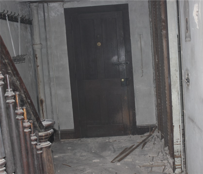 Fire damage to an entry way.