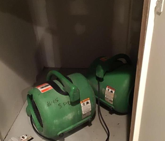 2 air dryers in closet.