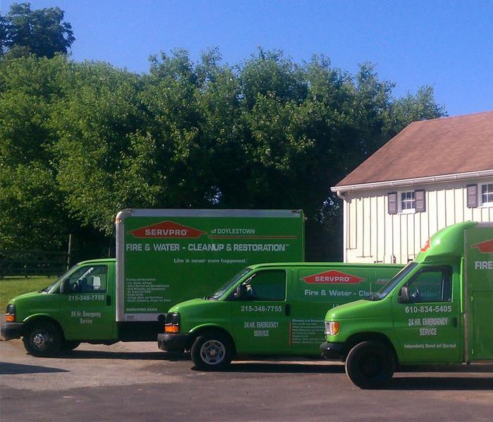 3 SERVPRO vehicles parked.