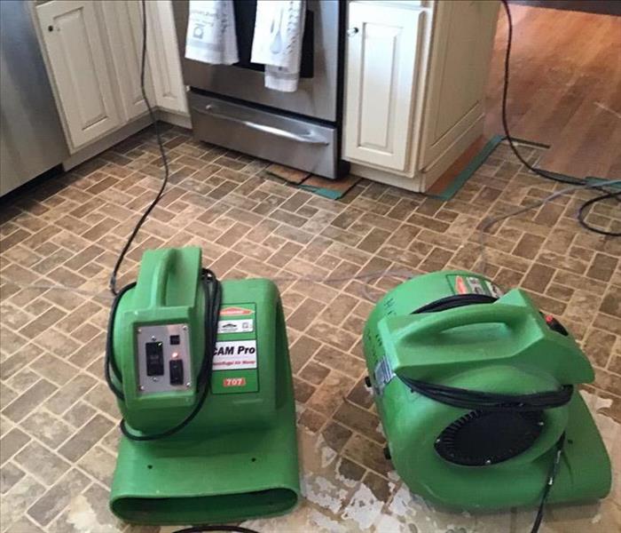 Drying equipment on floor.