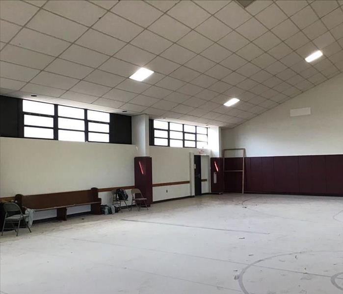 Large empty gym in need of restoration services