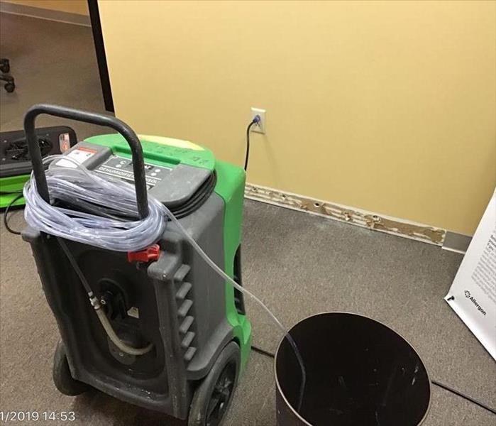 Equipment in commercial building drying the floor