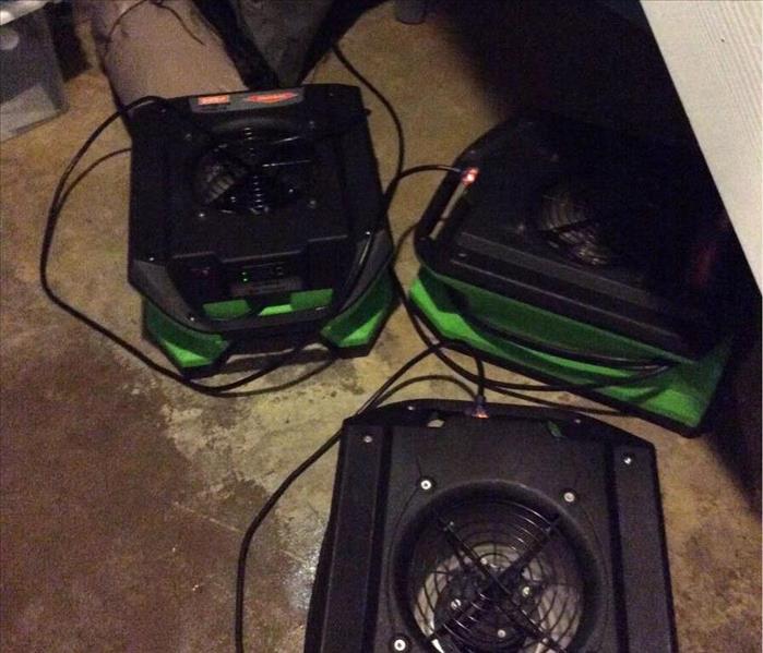 Drying equipment on floor.