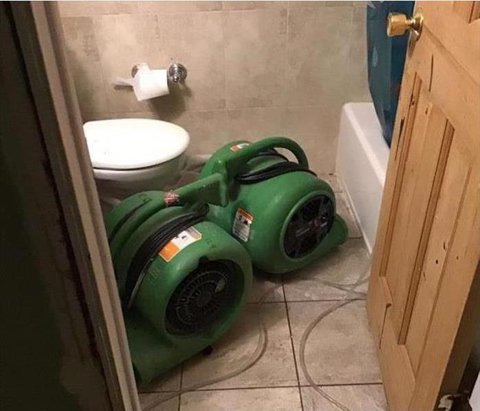 Air movers inside a bathroom.